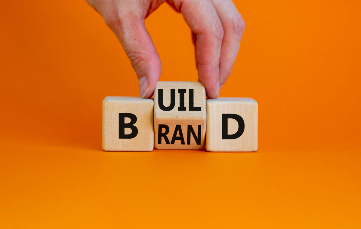 Building blocks that spell “build” and “brand” to illustrate how branding in B2B marketing takes time and effort.