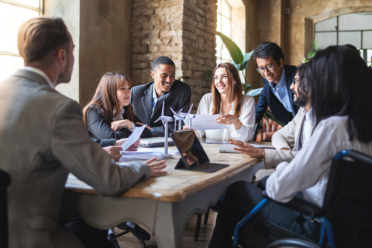 Professional team discussing their purpose-driven marketing strategy.